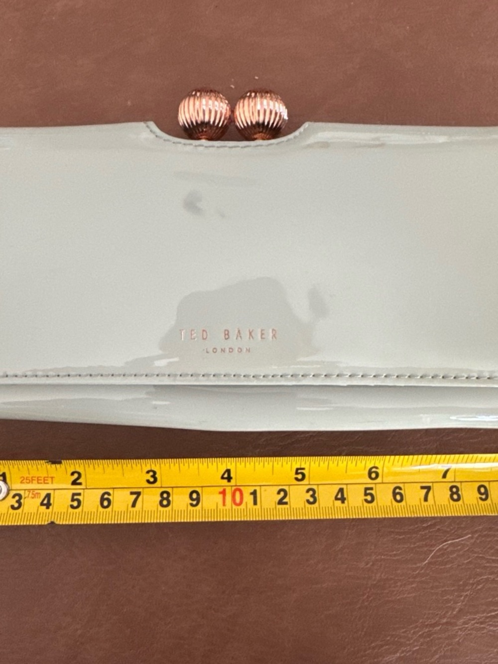 Ted Baker Glossy Patent Clutch in Light Gray with Rose-Gold Hardware